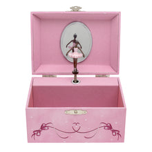 Pink music box with a black ballerina figurine inside.