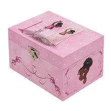 Pink jewellery box with a image of a black ballerina dancing in the mirror. Side view.